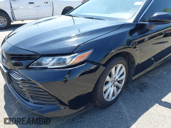 2020 Toyota Camry LE with VIN 4T1C11AKXLU955851, listed as a IAAI auction lot 41996827 with 59,008 mi miles and . Bid and sale history available at carsss.com. Image 19.