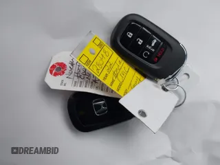 2022 Honda Civic Sport z VIN 2HGFE2F51NH597755, wystawiony jako IAAI lot #42006031 z przebiegiem 33 511 mil mil oraz . Historia ofert i sprzedaży dostępna na DreamBid. Obrazek 11.
