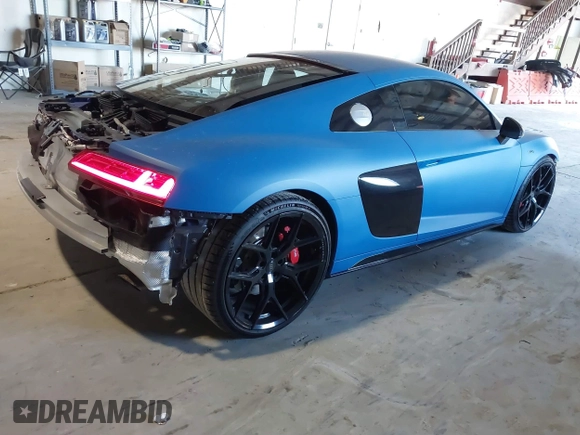2023 Audi R8 performance quattro with VIN WUACEAFX5P7902124, listed as a IAAI auction lot 41426635 with 3,438 mi miles and . Bid and sale history available at DreamBid. Image 4.
