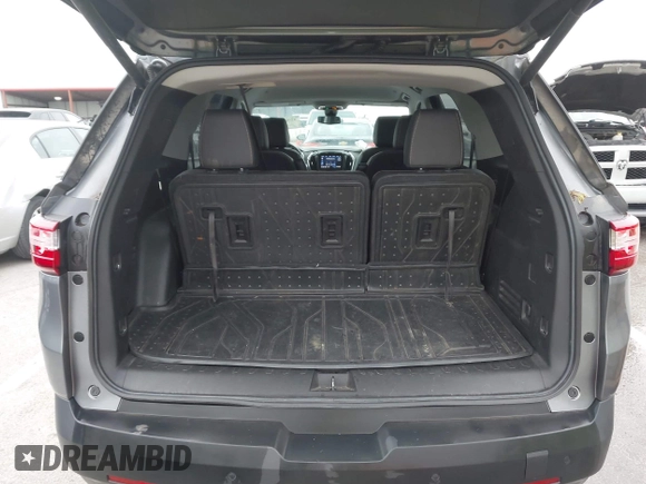 2020 Chevrolet Traverse RS with VIN 1GNEVJKW7LJ308092, listed as a IAAI auction lot 42061333 with 71,743 mi miles and . Bid and sale history available at DreamBid. Image 17.