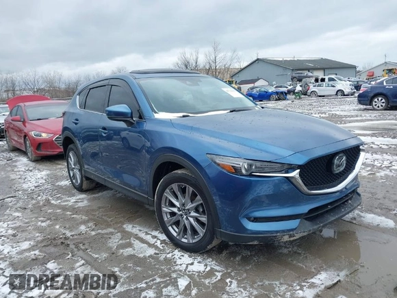 2020 Mazda CX-5 Grand Touring with VIN JM3KFBDM2L0778831, listed as a IAAI auction lot 41739655 with 72,533 mi miles. Bid and sale history available at carsss.com. Image 1.