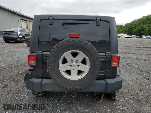 2012 Jeep Wrangler Unlimited Sport z VIN 1C4BJWDG9CL102626, wystawiony jako Copart lot #58421455 z przebiegiem 128 421 mil mil oraz Szkoda całkowita • Salvage title. Historia ofert i sprzedaży dostępna na DreamBid. Obrazek 6.