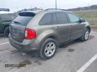 2013 Ford Edge SEL with VIN 2FMDK3JC8DBC81468, listed as a IAAI auction lot 41233506 with 206,107 mi miles. Bid and sale history available at carsss.com. Image 4.