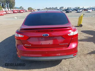 2014 Ford Focus Titanium with VIN 1FADP3J2XEL247827, listed as a IAAI auction lot 41959720 with 105,373 mi miles. Bid and sale history available at carsss.com. Image 16.