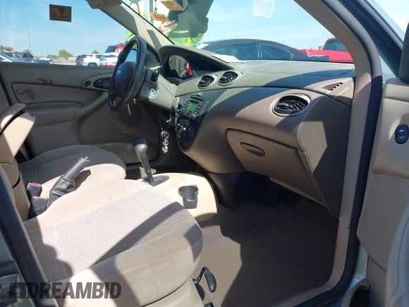 2003 Ford Focus SE with VIN 1FAFP34P53W162793, listed as a IAAI auction lot 42385636 with Not provided miles and . Bid and sale history available at DreamBid. Image 5.