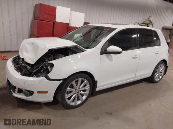 2012 Volkswagen Golf TDI z VIN WVWDM7AJ9CW296921, wystawiony jako IAAI lot #42070028 z przebiegiem 113 511 mil mil oraz . Historia ofert i sprzedaży dostępna na DreamBid. Obrazek 2.
