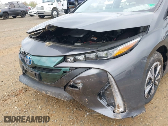 2018 Toyota Prius Plus with VIN JTDKARFP6J3078362, listed as a IAAI auction lot 42021835 with 61,170 mi miles and . Bid and sale history available at DreamBid. Image 6.