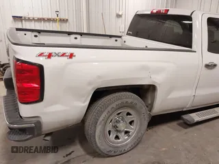 2014 Chevrolet Silverado 1500 Work Truck with VIN 1GCVKPEH5EZ249288, listed as a IAAI auction lot 41479579 with 141,549 mi miles and . Bid and sale history available at DreamBid. Image 18.