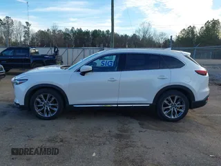 2016 Mazda CX-9 Grand Touring z VIN JM3TCADY4G0124588, wystawiony jako IAAI lot #41192549 z przebiegiem 161 272 mil mil oraz . Historia ofert i sprzedaży dostępna na DreamBid. Obrazek 14.