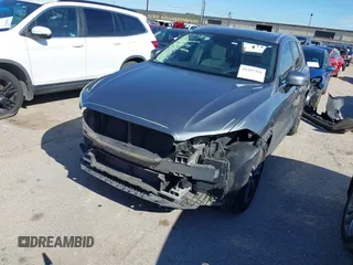2020 Volvo XC60 Momentum with VIN YV4A22RK7L1586688, listed as a IAAI auction lot 41257331 with 38,393 mi miles and . Bid and sale history available at DreamBid. Image 2.