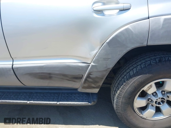 2003 Toyota 4Runner SR5 z VIN JTEZU14R830003562, wystawiony jako IAAI lot #42408101 z przebiegiem 269 316 mil mil oraz . Historia ofert i sprzedaży dostępna na DreamBid. Obrazek 6.