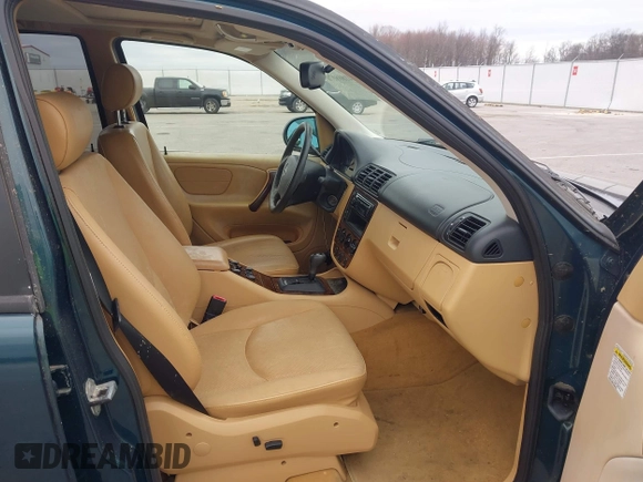 1999 Mercedes-Benz M 320/430/500 with VIN 4JGAB54E8XA055359, listed as a IAAI auction lot 41808170 with 161,573 mi miles and . Bid and sale history available at DreamBid. Image 5.
