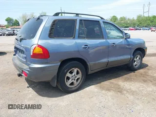 2002 Hyundai Santa Fe GLS with VIN KM8SC73D22U148410, listed as a IAAI auction lot 42159042 with 141,232 mi miles. Bid and sale history available at carsss.com. Image 4.