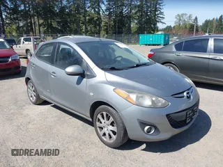 2013 Mazda 2 Touring z VIN JM1DE1LY5D0160410, wystawiony jako IAAI lot #42034986 z przebiegiem 124 791 mil mil oraz . Historia ofert i sprzedaży dostępna na DreamBid. Obrazek 1.