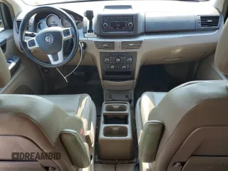 2012 Volkswagen Routan SE z VIN 2C4RVABG7CR391702, wystawiony jako Copart lot #57144765 z przebiegiem 97 122 mil mil oraz Szkoda całkowita • Salvage title. Historia ofert i sprzedaży dostępna na DreamBid. Obrazek 8.