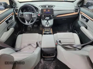 2020 Honda CR-V Touring с VIN 2HKRW2H9XLH631074, выставлен на аукционе Copart как лот 62957255 с пробегом 21 460 миль миль и Списание • Salvage title. История ставок и продаж доступна на DreamBid. Изображение 8.