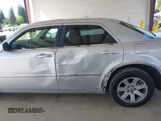 2005 Chrysler 300 Touring with VIN 2C3JA53G75H687752, listed as a IAAI auction lot 42190758 with 170,269 mi miles and . Bid and sale history available at DreamBid. Image 6.