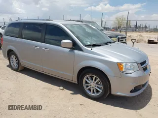 2018 Dodge Grand Caravan SXT z VIN 2C4RDGCG8JR241650, wystawiony jako IAAI lot #42646641 z przebiegiem 139 645 mil mil oraz . Historia ofert i sprzedaży dostępna na DreamBid. Obrazek 1.
