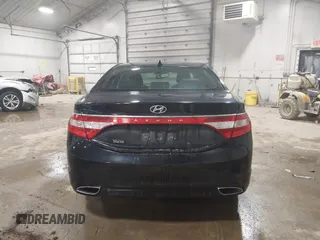 2013 Hyundai Azera z VIN KMHFG4JG4DA218608, wystawiony jako IAAI lot #41601792 z przebiegiem 101 846 mil mil oraz . Historia ofert i sprzedaży dostępna na DreamBid. Obrazek 16.