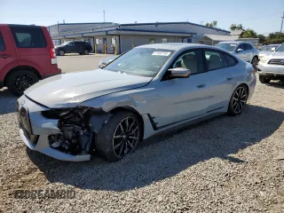 2023 BMW i4 M50 z VIN WBY33AW09PFR22046, wystawiony jako Copart lot #57665795 z przebiegiem 15 101 mil mil oraz Szkody całkowita. Historia ofert i sprzedaży dostępna na DreamBid. Obrazek 1.