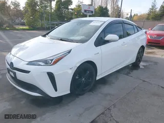 2021 Toyota Prius L Eco with VIN JTDKAMFU9M3131228, listed as a IAAI auction lot 41257117 with 72,840 mi miles. Bid and sale history available at carsss.com. Image 18.