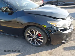 2016 Nissan Maxima SL z VIN 1N4AA6AP1GC383512, wystawiony jako IAAI lot #41490666 z przebiegiem 110 235 mil mil oraz . Historia ofert i sprzedaży dostępna na DreamBid. Obrazek 18.