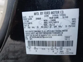 2007 Ford Edge SEL PLUS with VIN 2FMDK49C67BA64306, listed as a IAAI auction lot 41704309 with 216,627 mi miles. Bid and sale history available at carsss.com. Image 9.