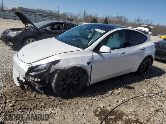 2023 Tesla Model Y Long Range with VIN 7SAYGDEE5PF691745, listed as a Copart auction lot 47784545 with 21,117 mi miles and Salvage Title. Bid and sale history available at DreamBid. Image 1.