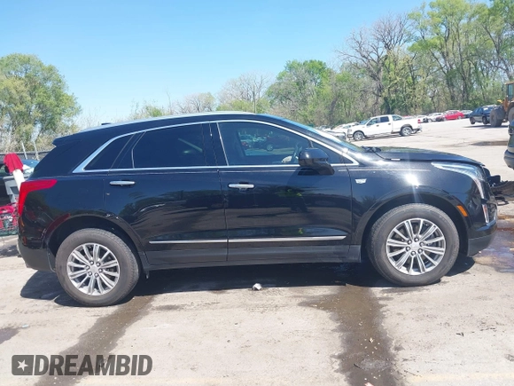 2017 Cadillac XT5 Luxury FWD z VIN 1GYKNBRS7HZ227732, wystawiony jako IAAI lot #42035099 z przebiegiem 76 260 mil mil oraz . Historia ofert i sprzedaży dostępna na DreamBid. Obrazek 13.