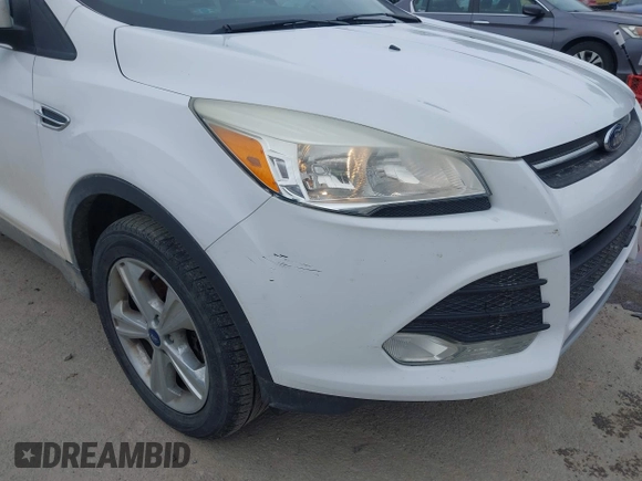2016 Ford Escape SE with VIN 1FMCU9GX1GUA76589, listed as a IAAI auction lot 42014929 with 125,294 mi miles. Bid and sale history available at carsss.com. Image 6.