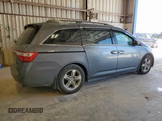 2012 Honda Odyssey Touring с VIN 5FNRL5H94CB049626, выставлен на аукционе Copart как лот 61191435 с пробегом 199 728 миль миль и Списание • Salvage title. История ставок и продаж доступна на DreamBid. Изображение 3.