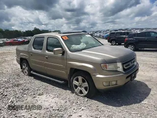 2011 Honda Ridgeline RTL with VIN 5FPYK1F59BB007045, listed as a Copart auction lot 61263715 with 159,527 mi miles and Clean title. Bid and sale history available at DreamBid. Image 14.