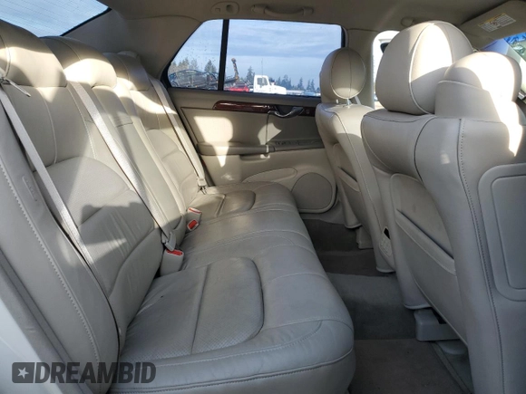 2002 Cadillac DeVille DTS with VIN 1G6KF57972U298182, listed as a Copart auction lot 80925674 with 89,416 mi miles and Salvage Title. Bid and sale history available at carsss.com. Image 10.
