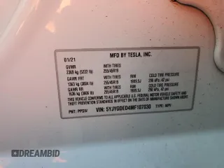 2021 Tesla Model Y Standard Range z VIN 5YJYGDED4MF107030, wystawiony jako Copart lot #66382913 z przebiegiem 39 024 mil mil oraz Szkoda całkowita • Salvage title. Historia ofert i sprzedaży dostępna na DreamBid. Obrazek 12.