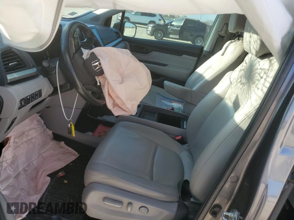 2019 Honda Odyssey Touring with VIN 5FNRL6H85KB022527, listed as a Copart auction lot 43851485 with 104,332 mi miles and Salvage Title. Bid and sale history available at carsss.com. Image 7.