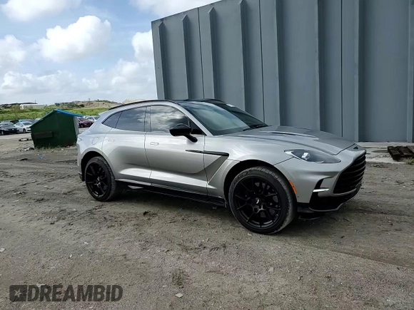 2023 Aston Martin DBX 707 z VIN SD7VUJBW0PTV08298, wystawiony jako Copart lot #77753224 z przebiegiem 3587 mil mil oraz Szkody całkowita. Historia ofert i sprzedaży dostępna na DreamBid. Obrazek 11.