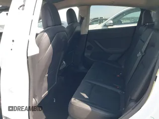 2022 Tesla Model Y Long Range with VIN 7SAYGDEE4NF428434, listed as a IAAI auction lot 41578503 with 35,460 mi miles and . Bid and sale history available at DreamBid. Image 8.