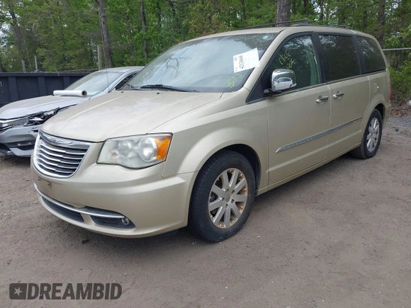 2011 Chrysler Town & Country Touring L z VIN 2A4RR8DG1BR703726, wystawiony jako IAAI lot #42134668 z przebiegiem 133 329 mil mil oraz . Historia ofert i sprzedaży dostępna na DreamBid. Obrazek 2.
