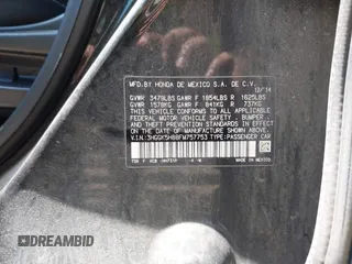 2015 Honda Fit EX-L with VIN 3HGGK5H88FM757753, listed as a IAAI auction lot 42096497 with 121,863 mi miles and . Bid and sale history available at DreamBid. Image 9.