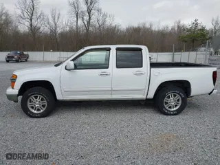 2011 Chevrolet Colorado LT w/1LT with VIN 1GCHTCFE6B8141559, listed as a IAAI auction lot 41812559 with 147,848 mi miles. Bid and sale history available at carsss.com. Image 14.