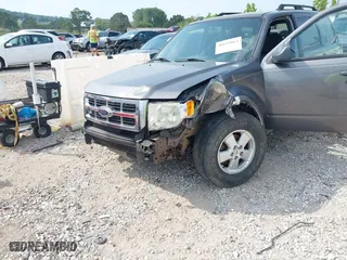 2009 Ford Escape XLT with VIN 1FMCU93G69KC27205, listed as a IAAI auction lot 40152013 with 187,084 mi miles. Bid and sale history available at carsss.com. Image 6.