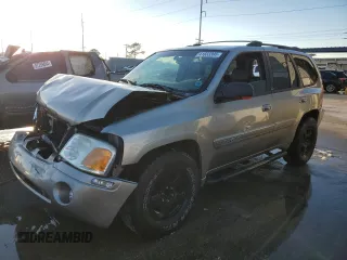2003 GMC Envoy SLT with VIN 1GKDS13S932325144, listed as a Copart auction lot 41833395 with 0 mi miles and Salvage Title. Bid and sale history available at carsss.com. Image 1.