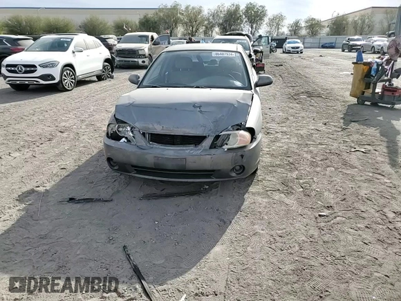 2003 Kia Spectra with VIN KNAFB121935265035, listed as a Copart auction lot 86407934 with 201,586 mi miles and Salvage Title. Bid and sale history available at DreamBid. Image 11.
