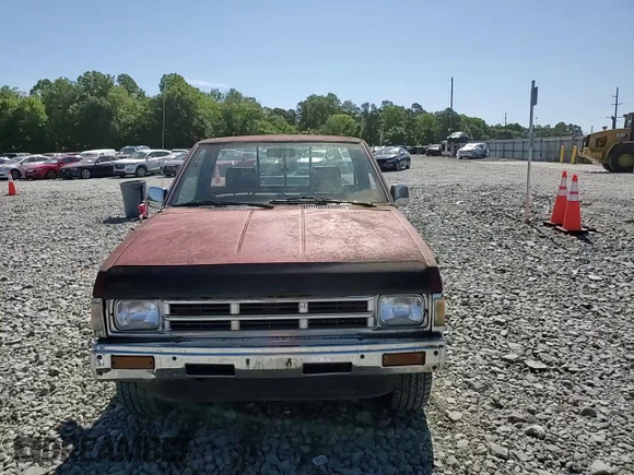 1991 Nissan Frontier XE with VIN 1N6SD11S2MC412375, listed as a Copart auction lot 61015515 with 201,629 mi miles and Salvage title. Bid and sale history available at DreamBid. Image 13.