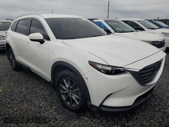 2021 Mazda CX-9 Sport with VIN JM3TCBBY3M0509113, listed as a Copart auction lot 74117544 with 34,861 mi miles and Non Repairable. Bid and sale history available at DreamBid. Image 4.
