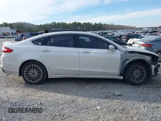 2015 Ford Fusion Titanium with VIN 3FA6P0K92FR274994, listed as a IAAI auction lot 41402325 with 157,332 mi miles. Bid and sale history available at carsss.com. Image 14.