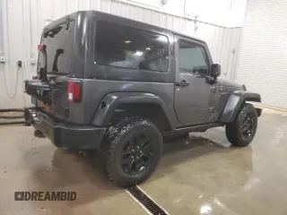 2017 Jeep Wrangler Willys Wheeler with VIN 1C4AJWAG9HL696710, listed as a Copart auction lot 88744905 with 66,800 mi miles and Salvage Title. Bid and sale history available at DreamBid. Image 3.