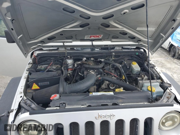 2008 Jeep Wrangler X with VIN 1J4FA24168L549082, listed as a Copart auction lot 58178805 with 150,606 mi miles and Salvage title. Bid and sale history available at DreamBid. Image 12.