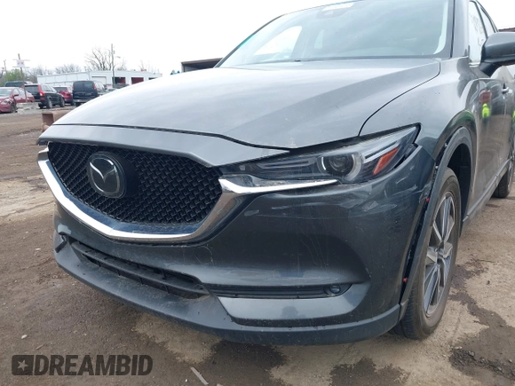 2017 Mazda CX-5 Grand Touring with VIN JM3KFBDL3H0143194, listed as a IAAI auction lot 42049258 with 74,159 mi miles. Bid and sale history available at carsss.com. Image 6.