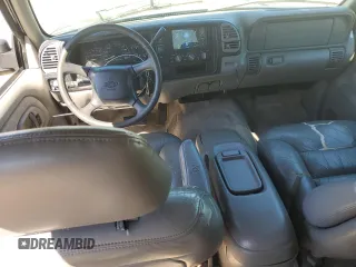 1999 Chevrolet Suburban with VIN 1GNEC16R1XJ394144, listed as a Copart auction lot 50418185 with 173,037 mi miles and Salvage title. Bid and sale history available at DreamBid. Image 8.